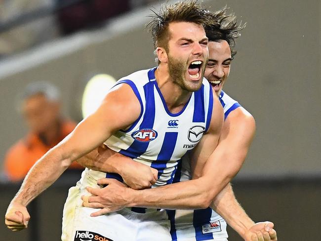 Luke McDonald and Taylor Garner celebrate a late goal.