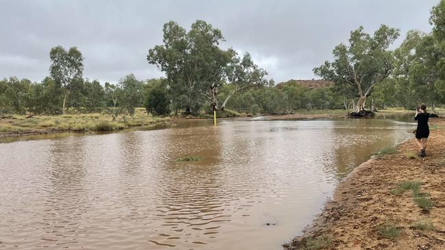 The Todd River flows after heavy rain