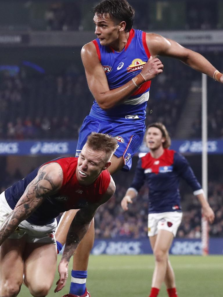 Jamarra Ugle-Hagan kicks the match-winning goal against Melbourne on Saturday night.