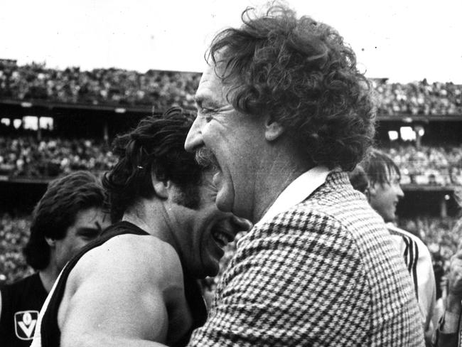 Coach Tony Jewell embraces Francis Bourke after the 1980 grand final. Jewell would return before being sacked again.