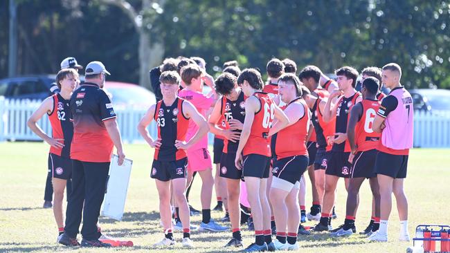 Wilston Grange players rally at a quarter time break. Picture, John Gass