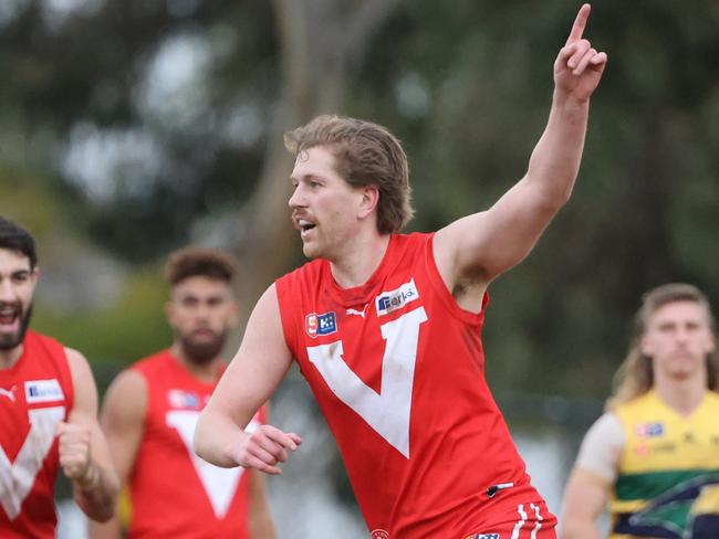 Aaron Young from the Roosters reacts after scoring a goal during the Round 16 SANFL match between North Adelaide and Woodville West Torrens at Prospect Oval in Adelaide, Sunday, July 24, 2022. (SANFL Image/David Mariuz)