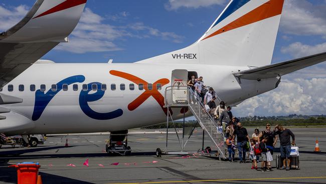 Passengers disembark at Gold Coast airport. Picture: Jerad Williams