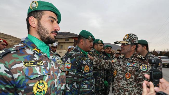 Soldiers take part in a military drill at an undisclosed location in Iran, which has expanded drills to cover two additional nuclear facilities in the west and centre of the country. Picture: Iranian Army Office/AFP