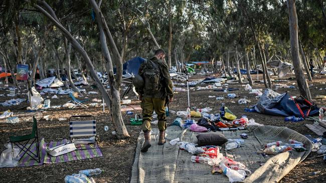 An Israeli soldier patrols near Kibbutz Beeri in southern Israel, close to the place where 270 festival revellers were killed by militants on October 7. Picture: AFP