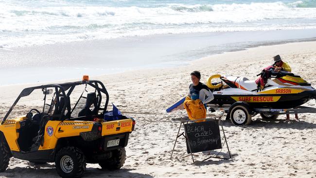 Byron Bay lifeguards patrolling the closed beach today. Picture: Adam Head