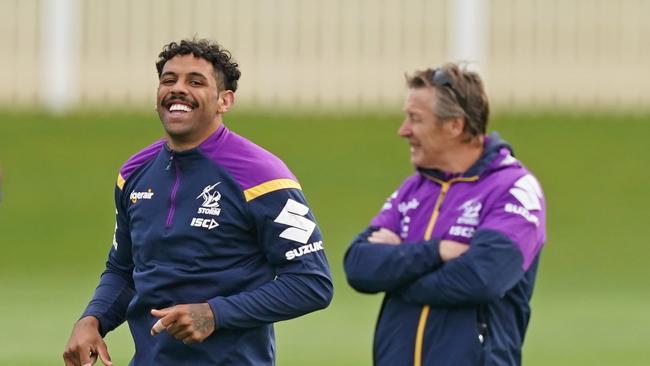 Melbourne winger Josh Addo-Carr and coach Craig Bellamy during training on Wednesday. Picture: AAP Image/Scott Barbour