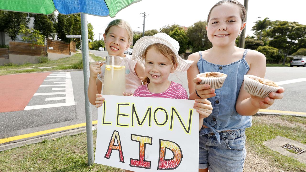 Australians like Zoe, 9, Georgie, 6, and Annika, 9, are happy to help in times of need, such as selling lemonade, cookies and muffins to raise money for bushfire victims in 2019. Picture: AAP Image
