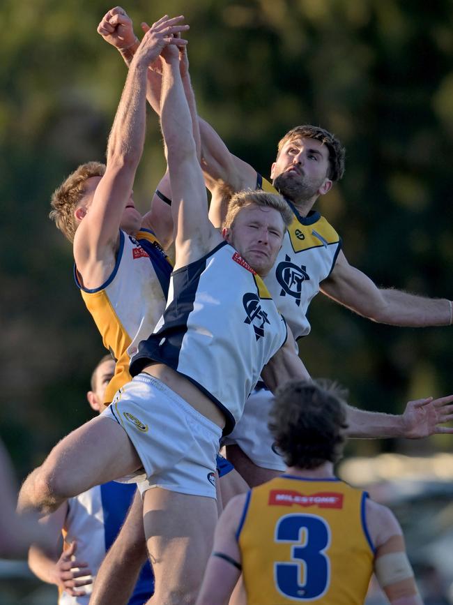 NFNL: Macleod and Hurstbridge players fly for the ball. Picture: Andy Brownbill