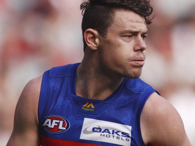 Lachie Neale of the Lions runs with the ball during the Round 4 AFL match between the Essendon Bombers and the Brisbane Lions at the MCG in Melbourne, Saturday, April 13, 2019. (AAP Image/Daniel Pockett) NO ARCHIVING, EDITORIAL USE ONLY