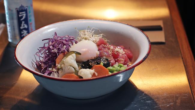 Poke bowl with tuna, white rice, creamy seasame dressing and onsen egg at Panko Chan, Kingston Beach. Picture: LUKE BOWDEN