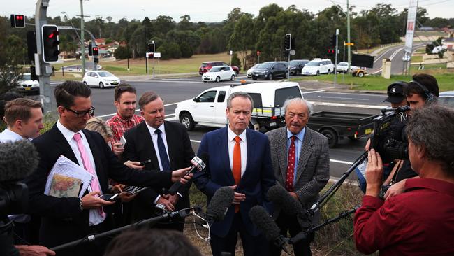 Opposition leader Bill Shorten (centre) pictured with Macarthur Federal Labor MP Mike Freelander and Opposition Transport spokesman Anthony Albanese announce a $50 million federal election promise for Appin Rd. The promise was then matched by the Liberal Government. Picture: Toby Zerna