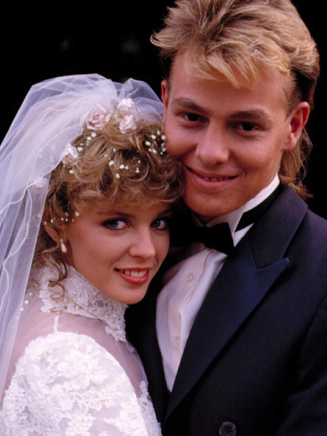 Kylie Minogue and Jason Donovan as. Scott and Charlene.