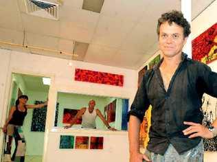 LIFESTYLE: Eltham artist Jay Manby, pictured in a Magellan St space, is one of many to have benefited from the Art in the Heart concept. Picture: Jacklyn Wagner