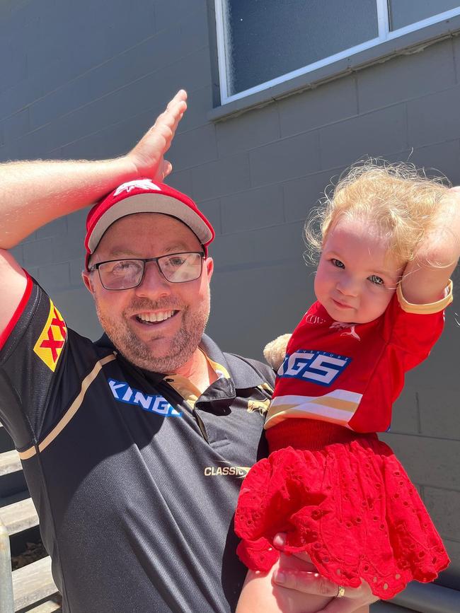 Jamie Ray, 33, and Charlotte Ray, 2, of Redcliffe enjoying the Dolphin's debut NRL game against the Sydney Roosters at Suncorp Stadium on Sunday, March 5, 2023. Picture: Jamie-Leigh Ray