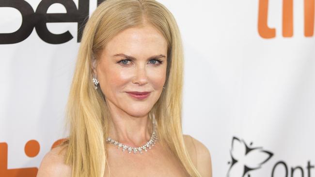 Nicole Kidman poses for photographers on the red carpet for 
