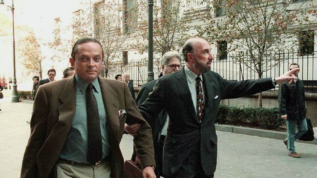 Alec Wildenstein led by his lawyer Raoul Felder, on his way to court to face another tussle with his estranged wife Jocelyn. Picture: Supplied