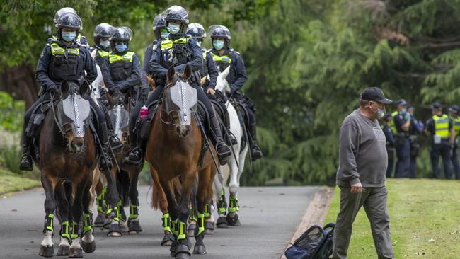 Police patrol the streets of Melbourne CBD on Saturday after a protest in Treasury gardens. Picture: NCA NewsWire / David Geraghty