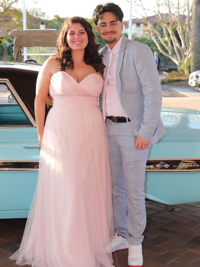 Madison Levett, 16, and Tama Makara, 17, at the Ormeau Woods School formal at Links Resort, Hope Island. Picture Glenn Hampson