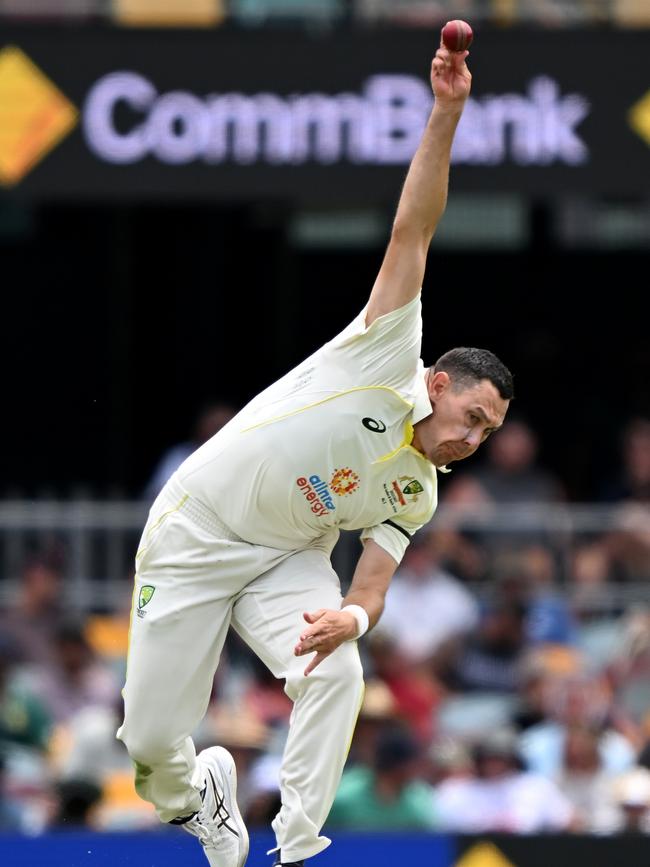 Scott Boland in action at the Gabba. Picture: Bradley Kanaris/Getty