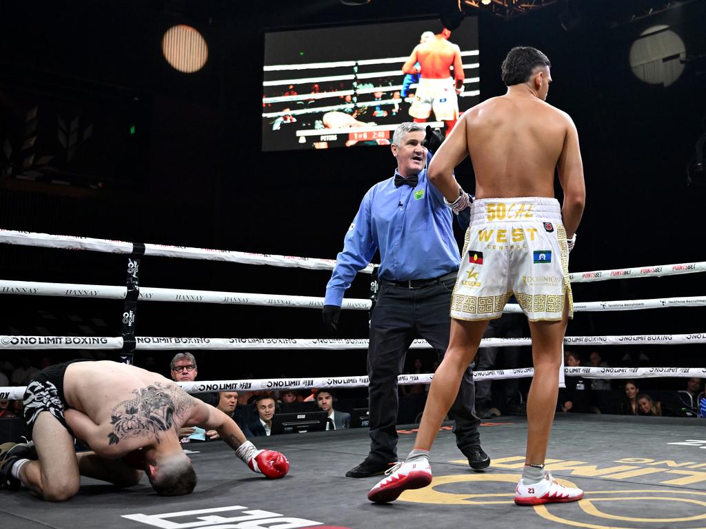 Callum Peters (R) won his fight wearing football shoes. Pictures: No Limit Boxing/Gregg Porteous