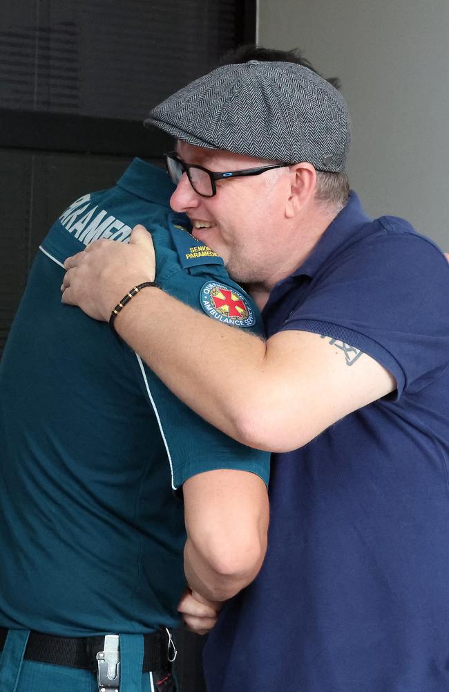 Steve Preston meets the paramedics that saved his life, Eagleby. Picture: Liam Kidston