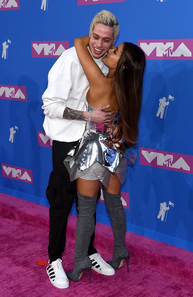 Pete Davidson and Ariana Grande get close during the 2018 MTV Video Music Awards at Radio City Music Hall on August 20, 2018 in New York City. Picture: Getty Images