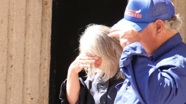 Deborah Lynne Roberts (left) leaves the Alice Springs Local Court Tuesday. Picture: Gera Kazakov