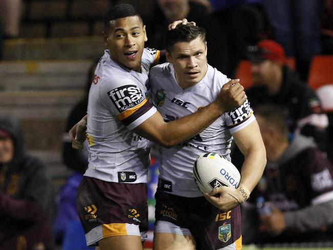 James Roberts scores a try against the Knights.