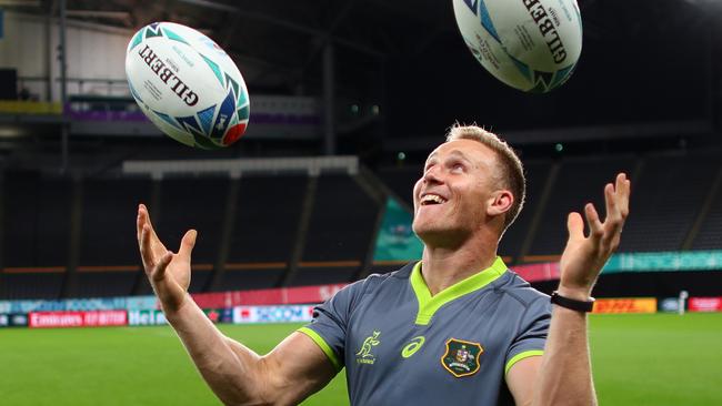 SAPPORO, JAPAN - SEPTEMBER 20:  Reece Hodge of Australia tries to juggle rugby balls following the Australian Wallabies Captain's Run ahead of their opening game against Fiji at the Sapporo Dome on September 20, 2019 in Sapporo, Japan. (Photo by Dan Mullan/Getty Images)