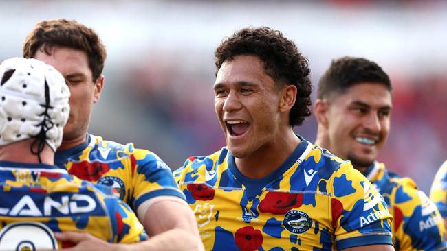 Hayze Perham of the Eels celebrates a try to Dylan Brown, far right (Photo by Matt King/Getty Images)