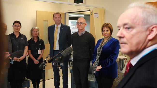 Dr Frank O’Keeffe, right, at the press conference he gatecrashed on Monday. Picture: SAM ROSEWARNE