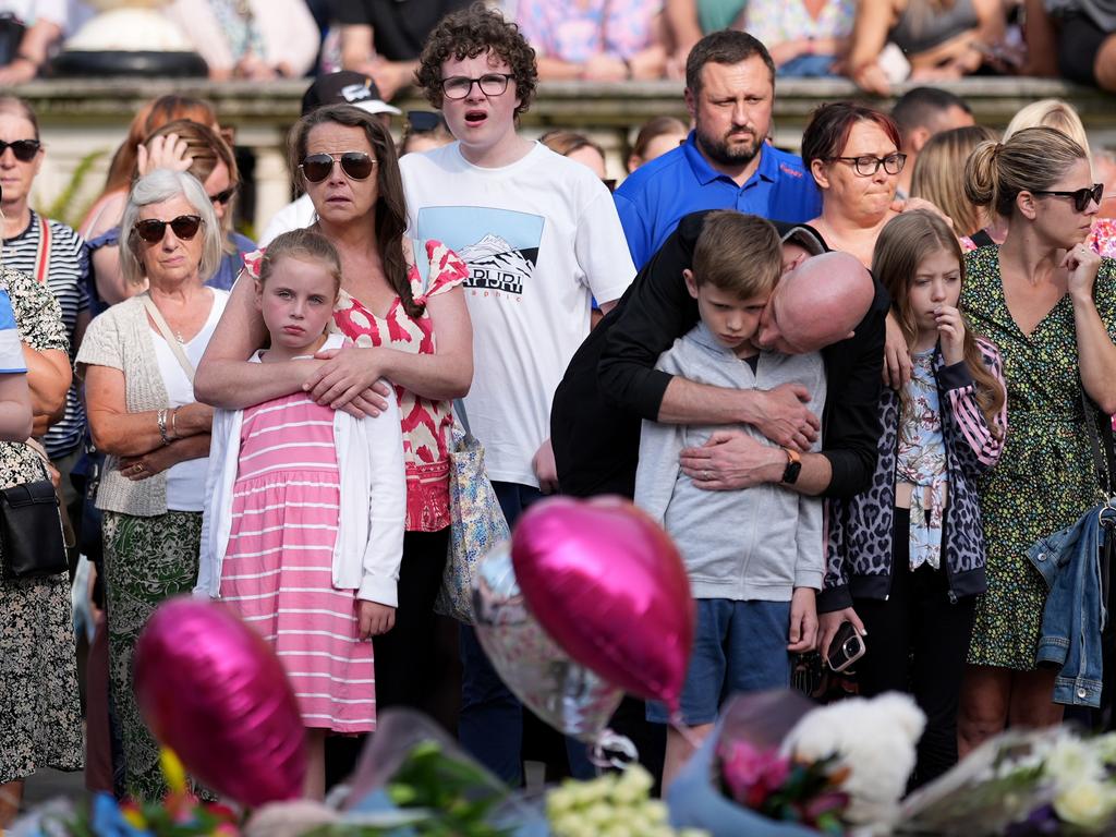 People attend a vigil outside the Atkinson venue in central Southport. Picture: Getty Images