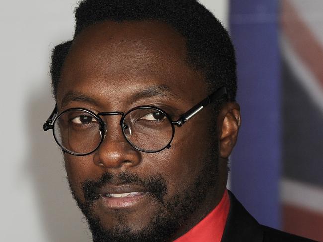 21/02/2012 WIRE: Performer will.i.am of The Black Eyed Peas arrives for the Brit Awards 2012 at the O2 Arena in London, Tuesday, Feb. 21, 2012. (AP Photo/Jonathan Short) Pic. Ap