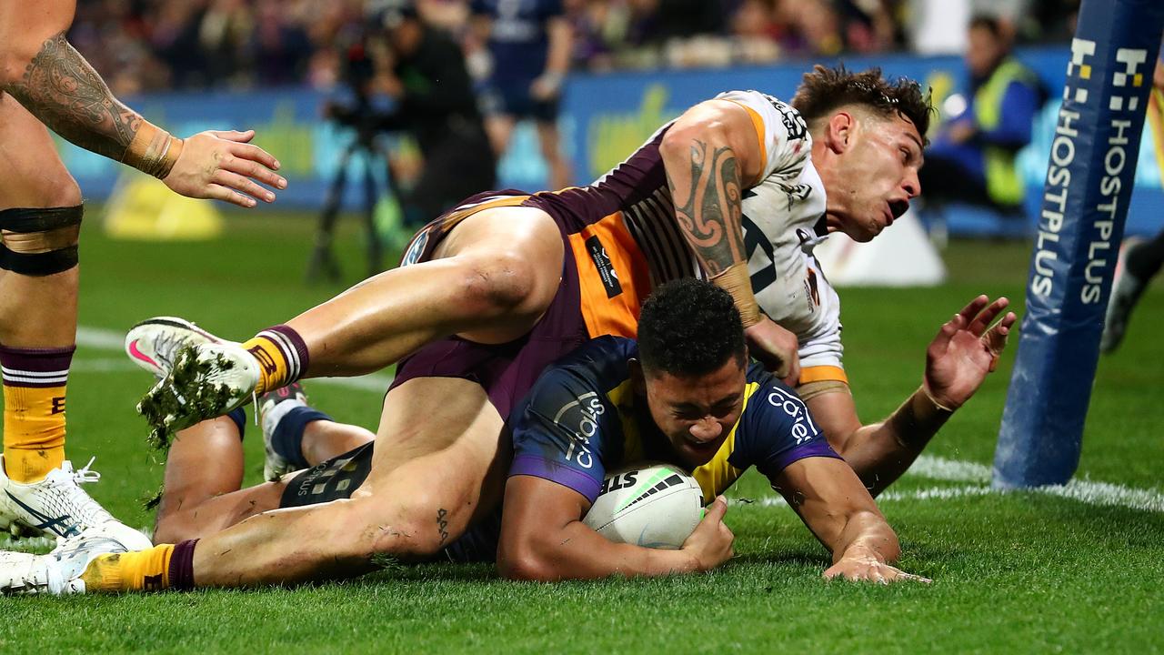 Jordan Riki couldn’t stop Dean Ieremia scoring in the corner. Picture: Kelly Defina/Getty Images