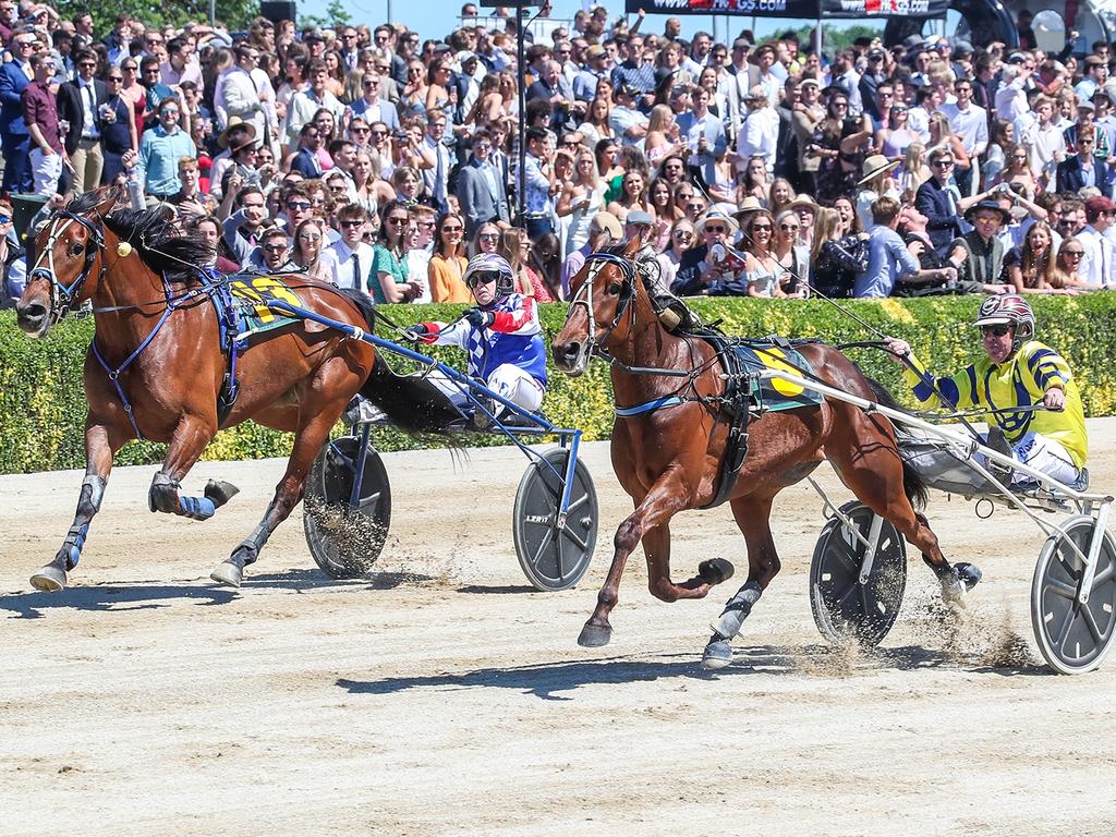 Tough Monarch (right) wins the Group 1 trotters’ free-for-all in Addington last month.