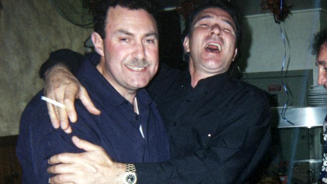 Mario Condello being embraced by Nik Radev. Picture: Supplied