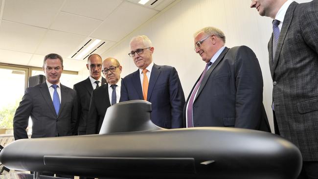 Malcolm Turnbull with French and Australian officials when the subs deal was sealed in 2016. Picture: AAP