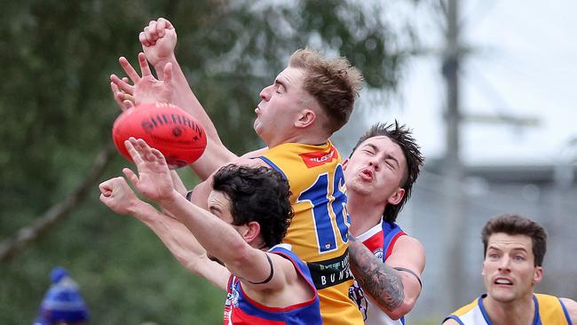 Reid Brandt crashes a pack for Macleod. Picture: George Salpigtidis