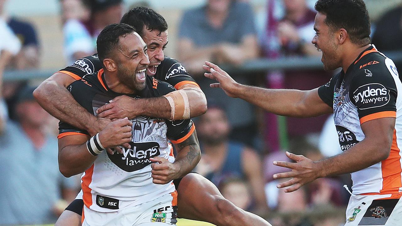 Benji Marshall scored his first try for the Tigers in five years - and then added a second - in his side’s big win over Manly. Photo: Phil Hillyard