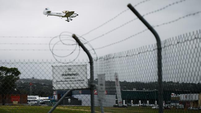 A plane over Parafield Airport, north of Adelaide, earlier this year. Picture: AAP / Morgan Sette