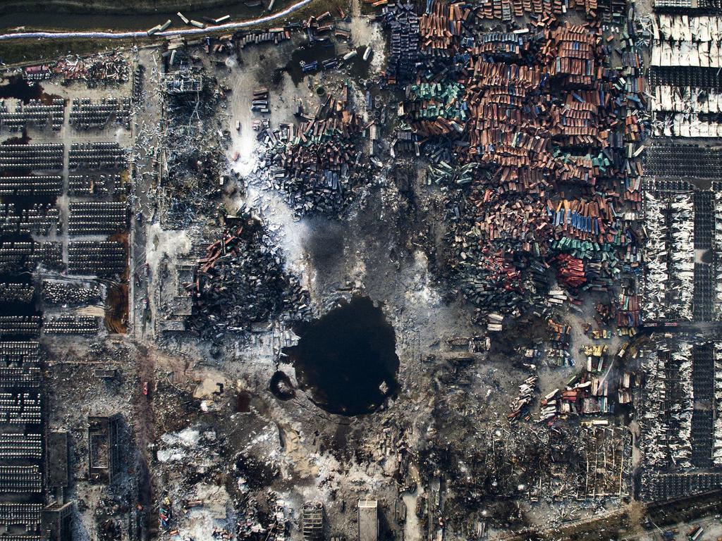 “Tianjin Explosion” by photographer Chen Jie which won third prize in the General News singles category shows an aerial view of the destruction after the explosion in Tianjin, China, Aug. 15, 2015.(Chen Jie, World Press Photo via AP)