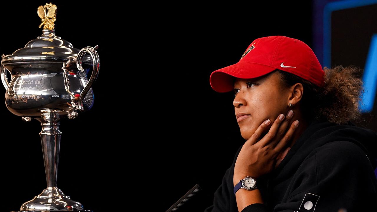 Naomi Osaka speaks at a press conference after winning her women's singles final match. (Photo by Natasha Morello/AFP)