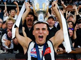 MELBOURNE, AUSTRALIA - SEPTEMBER 30: Nick Daicos of the Magpies celebrates with the premiership cup during the 2023 AFL Grand Final match between the Collingwood Magpies and the Brisbane Lions at the Melbourne Cricket Ground on September 30, 2023 in Melbourne, Australia. (Photo by Dylan Burns/AFL Photos via Getty Images)