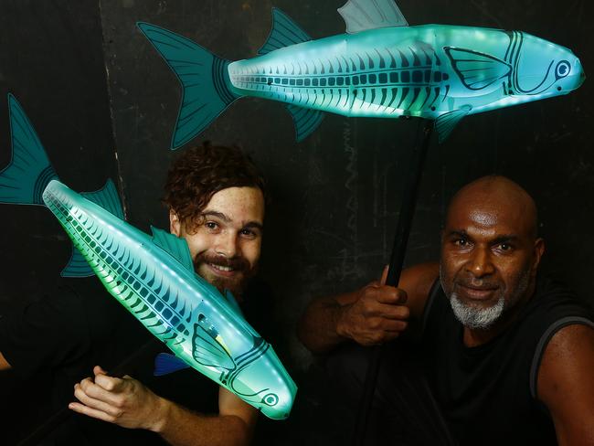 Nick O'Regan and Albert David with their glowing fish. They will be performing in Winter Camp at Barangaroo as part of Vivid. Picture: John Appleyard