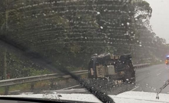 A car flipped between Buderim and Forest Glen exit north bound. Picture: Sean Kerr