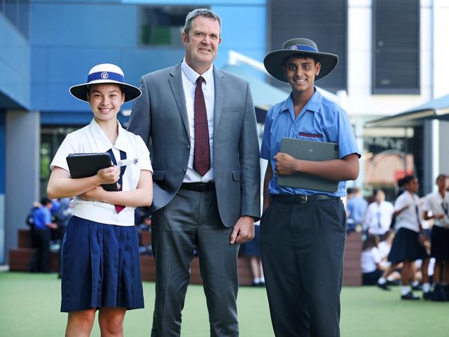 Brisbane State High School executive principal Greg Pierce with Year 9 students Lucy Choi-Lawrence and Kaizen Dissanayake. Picture: Tara Croser