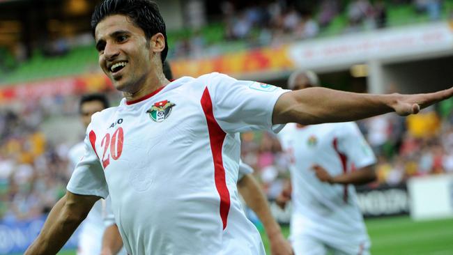 Hamza Aldaradreh of Jordan celebrates his third goal during the Group D Asian Cup football match between Palestine and Jordan in Melbourne on January 16, 2015. AFP PHOTO / MAL FAIRCLOUGH IMAGE RESTRICTED TO EDITORIAL USE - STRICTLY NO COMMERCIAL USE