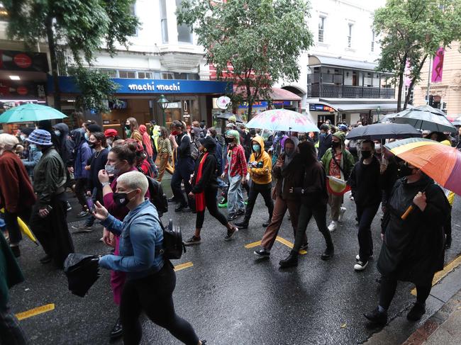 Umbrellas were out in force for Brisbane’s NAIDOC Week march. Picture: Annette Dew