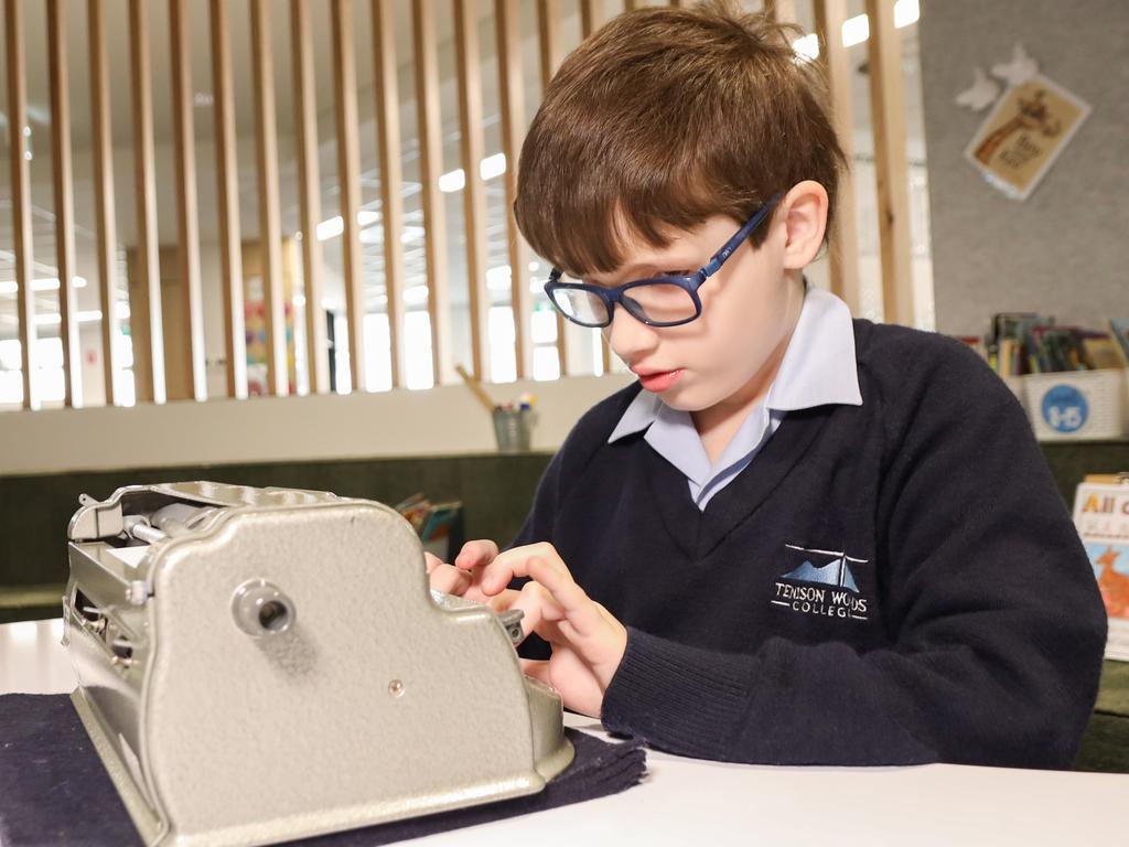 Vision-impaired Declan Lee used his special braille writer to participate in the school round of the Prime Minister's Spelling Bee with the help of his teaching team. Picture: supplied